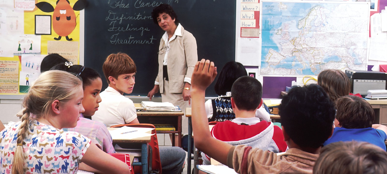 Online classroom with a teacher and a laptop